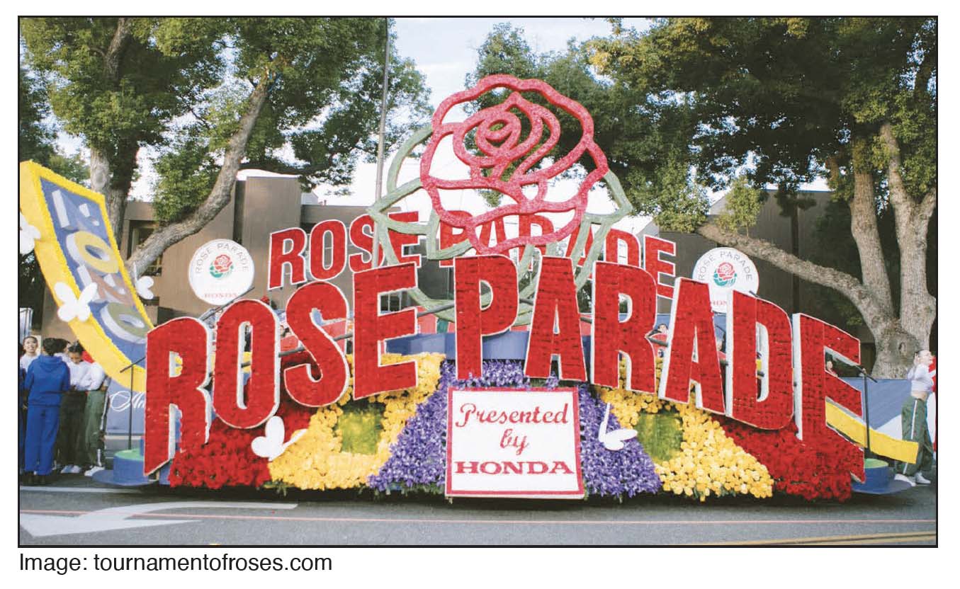 Float covered with roses. Words Rose Parade is on front, presented by Honda.